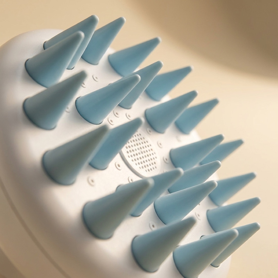 Close detail of the nozzle face and massage nodes