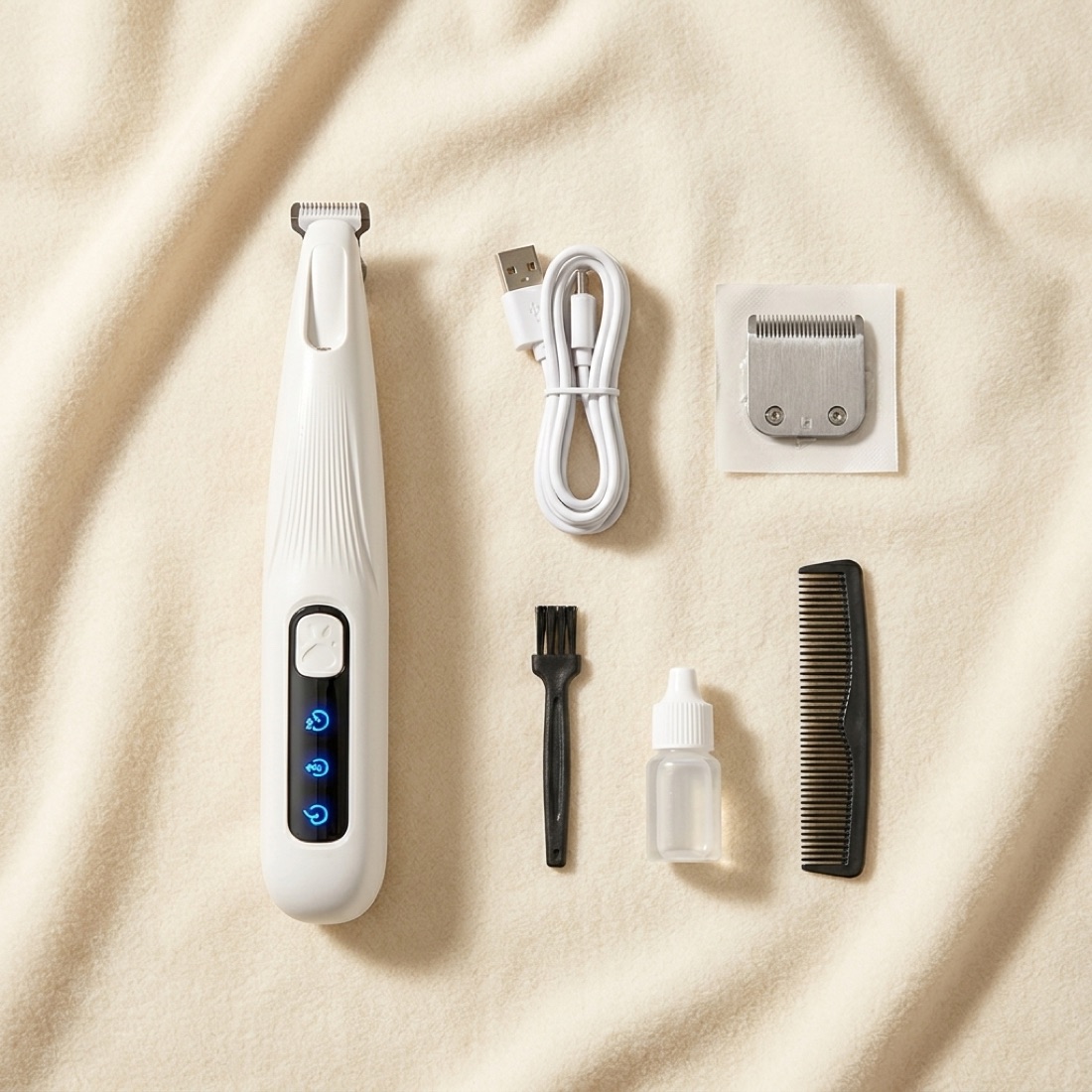 The trimmer laid out with charging cable and accessories